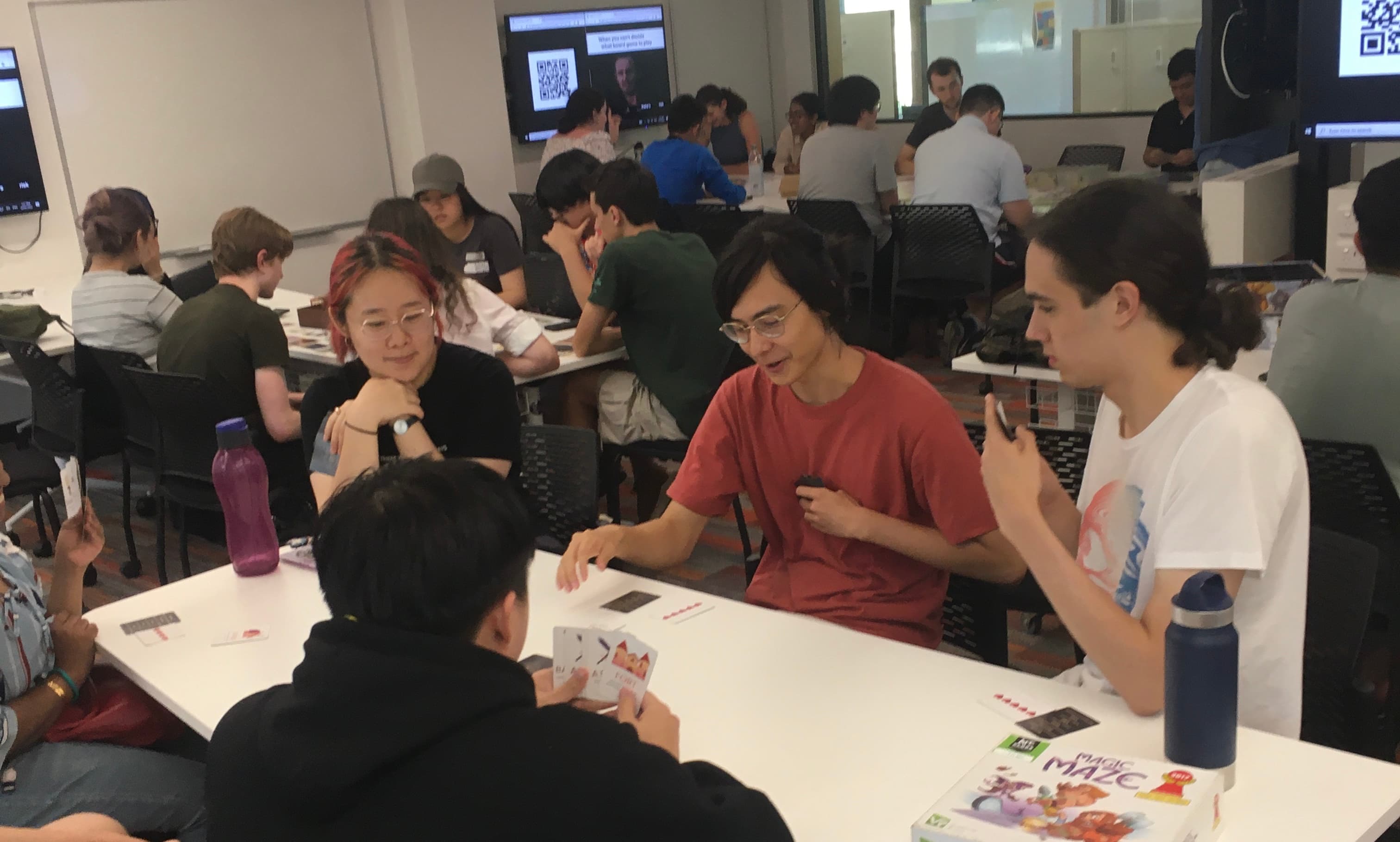 People playing boardgames at our weekly boardgame events